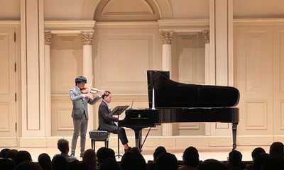Young violinist fulfills musical destiny
